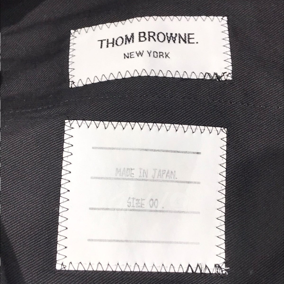 トム・ブラウンのウールスラックスです。 THOM BROWNE ボトムス 古着・中古アイテム