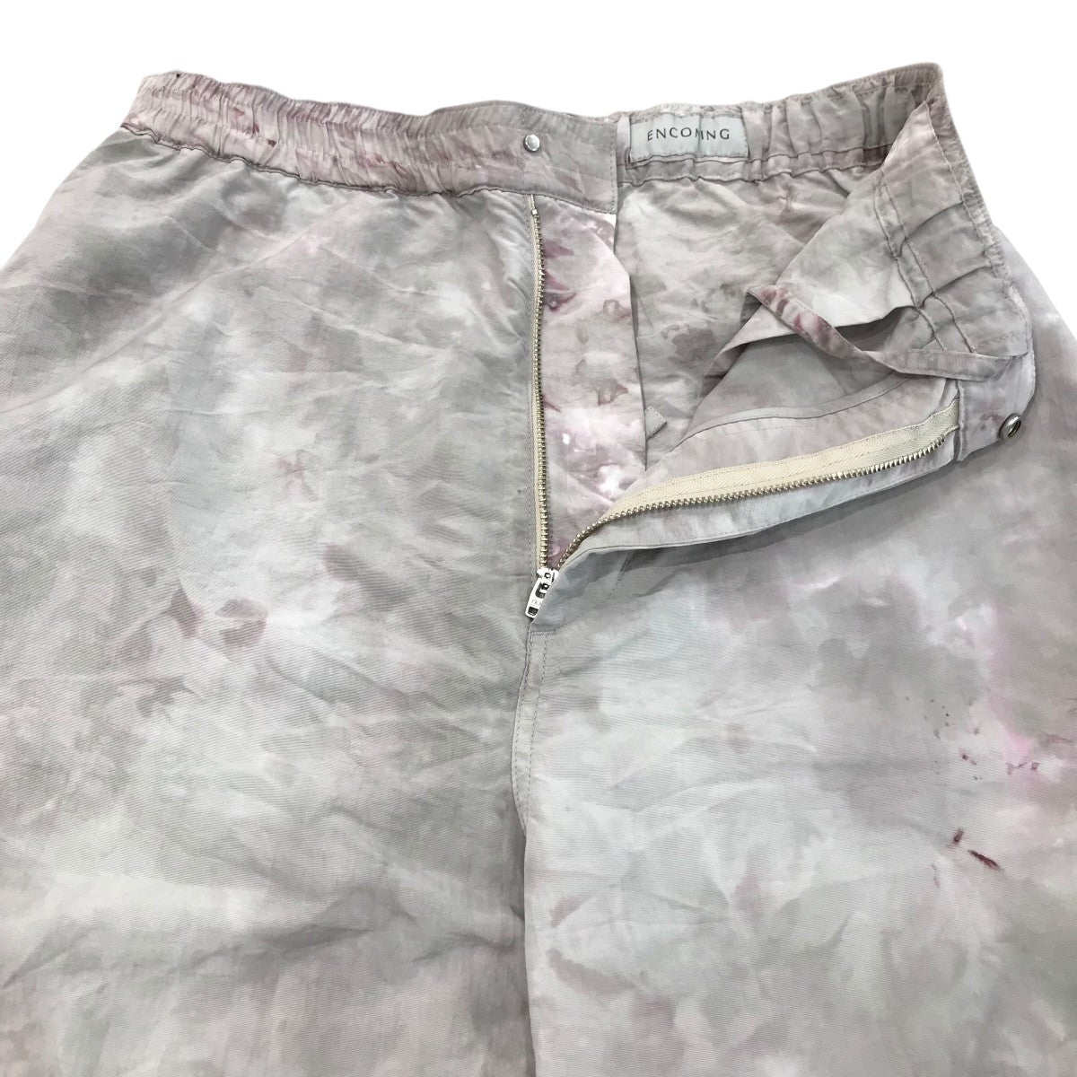 「PULLCORD PANELED TROUSER」染め加工ナイロンパンツ