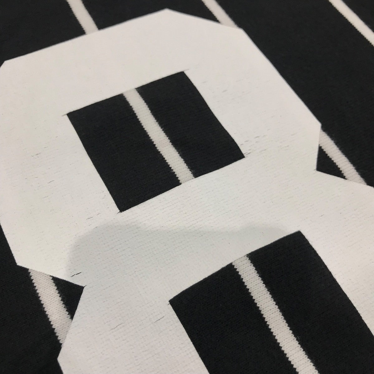 Supreme(シュプリーム) 24AW「Stripe Raglan L S Top」ロゴニット