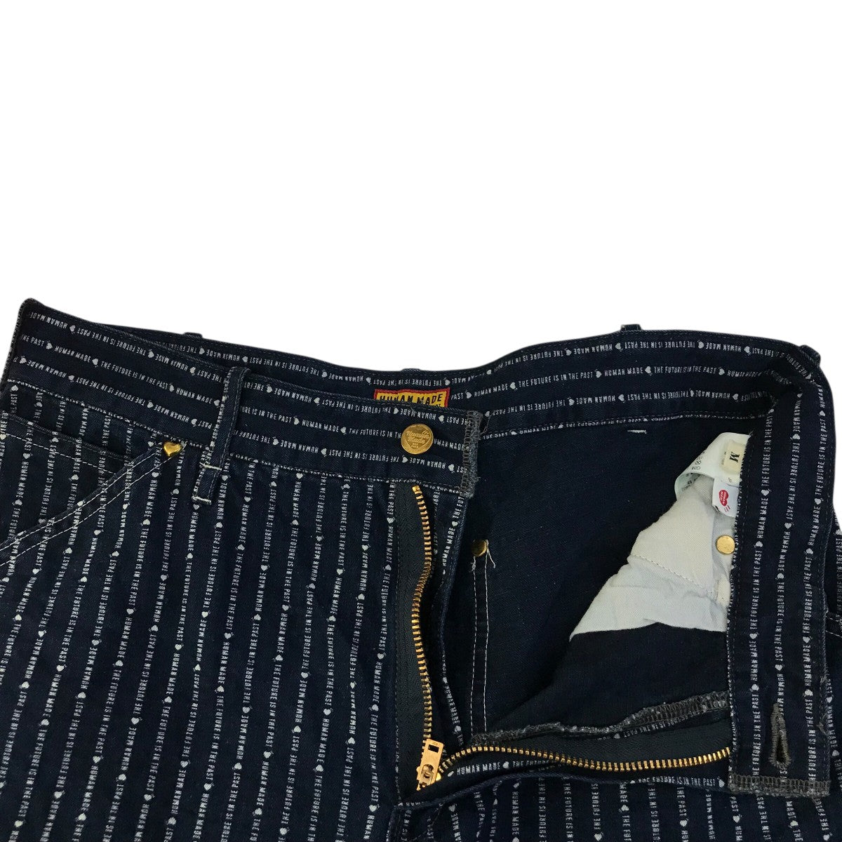 HUMAN MADE(ヒューマンメイド) 「WABASH WORK PANTS」ロゴストライプ