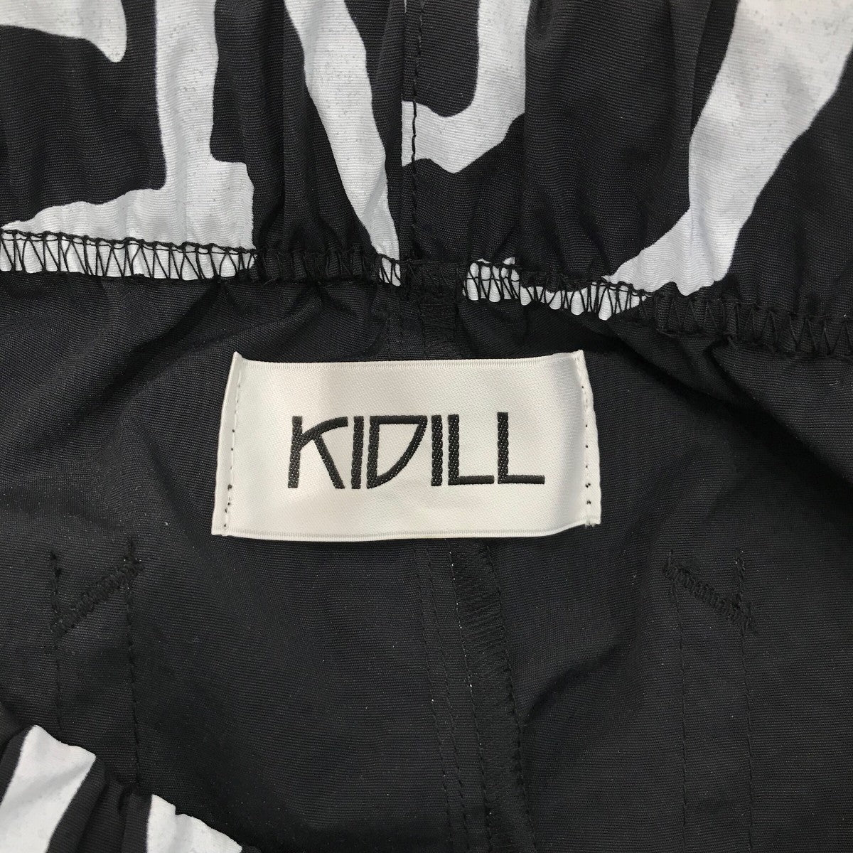 KIDILL(キディル) 「PUNK TEXT LOOSE FIT PANTS」パンクテキストルーズ
