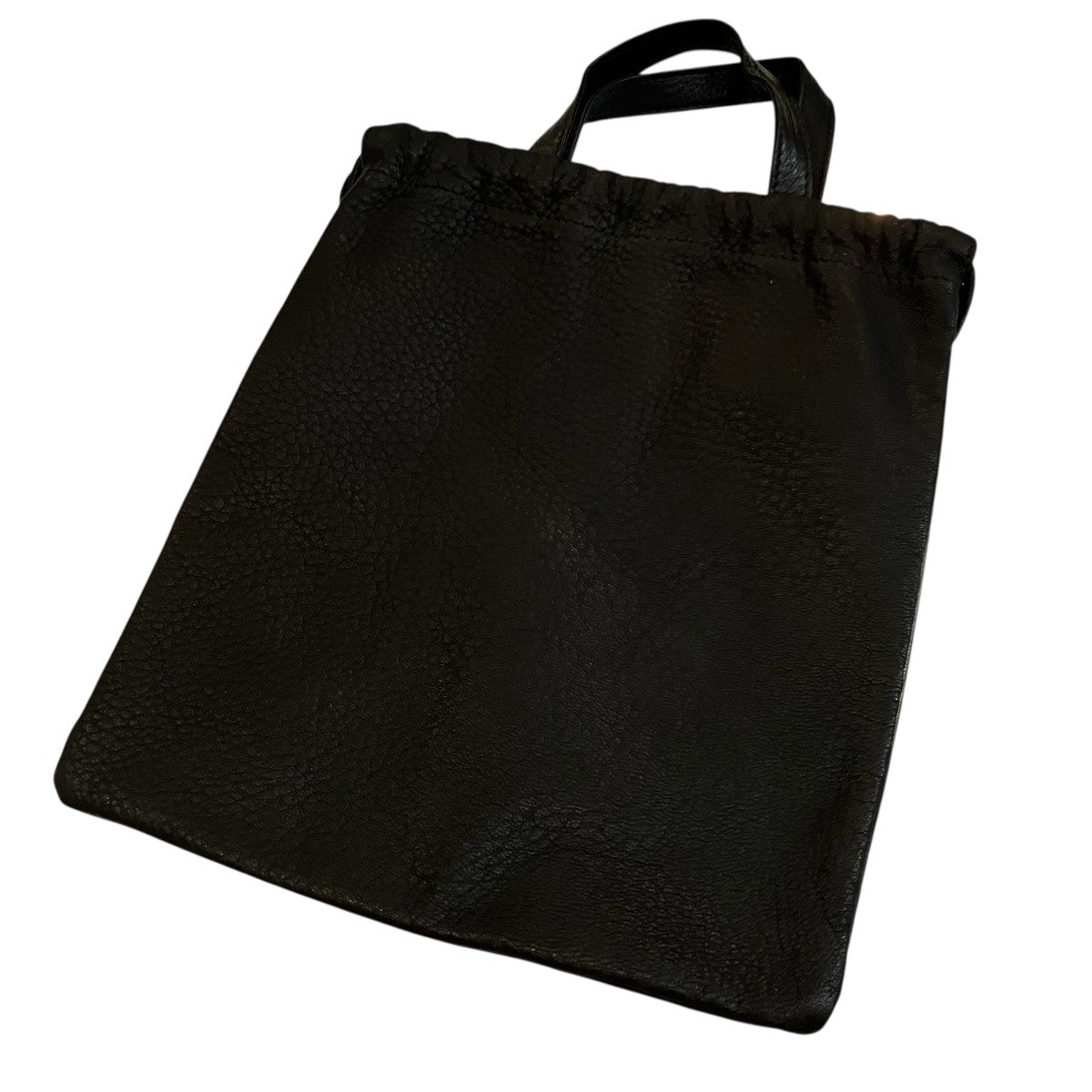 「DOUBLE FACED DRAWSTRING POUCH」レザーポーチ