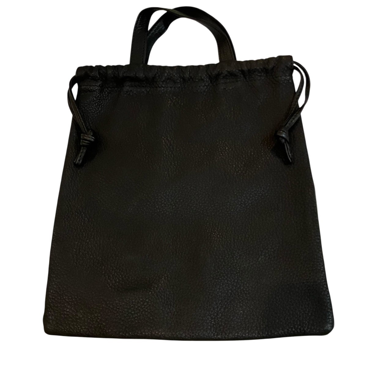 「DOUBLE FACED DRAWSTRING POUCH」レザーポーチ