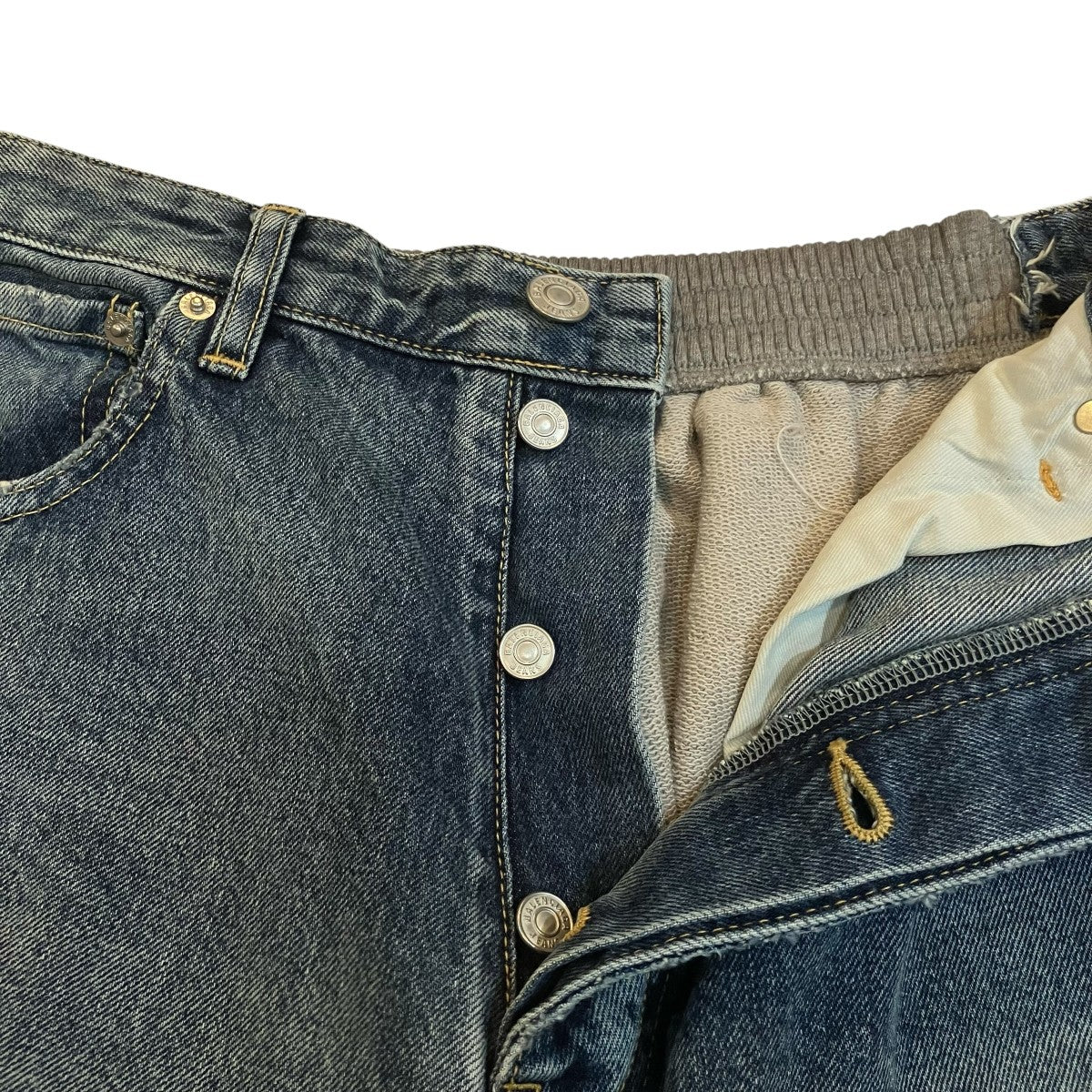 「HYBRID BAGGY JEANS」スウェットドッキングデニムパンツ738761
