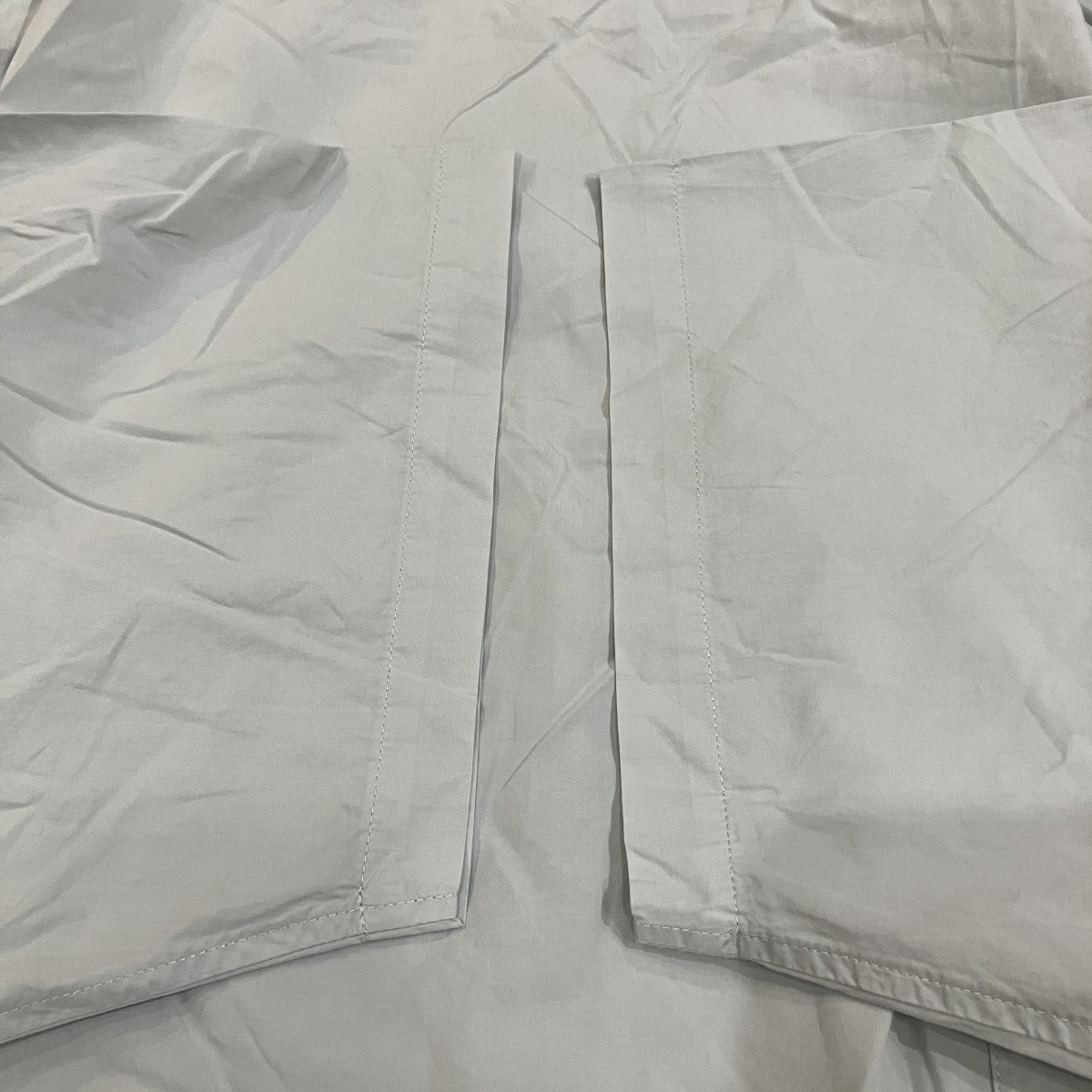 「DRAPED SHIRT」ナイロンＴシャツ