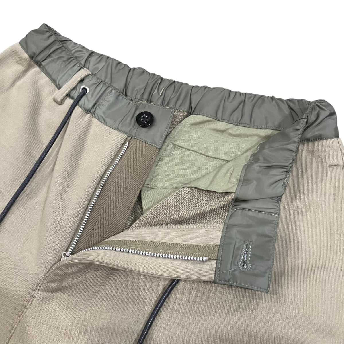 sacai(サカイ) ナイロン切替スウェットジャージーロングパンツ 23