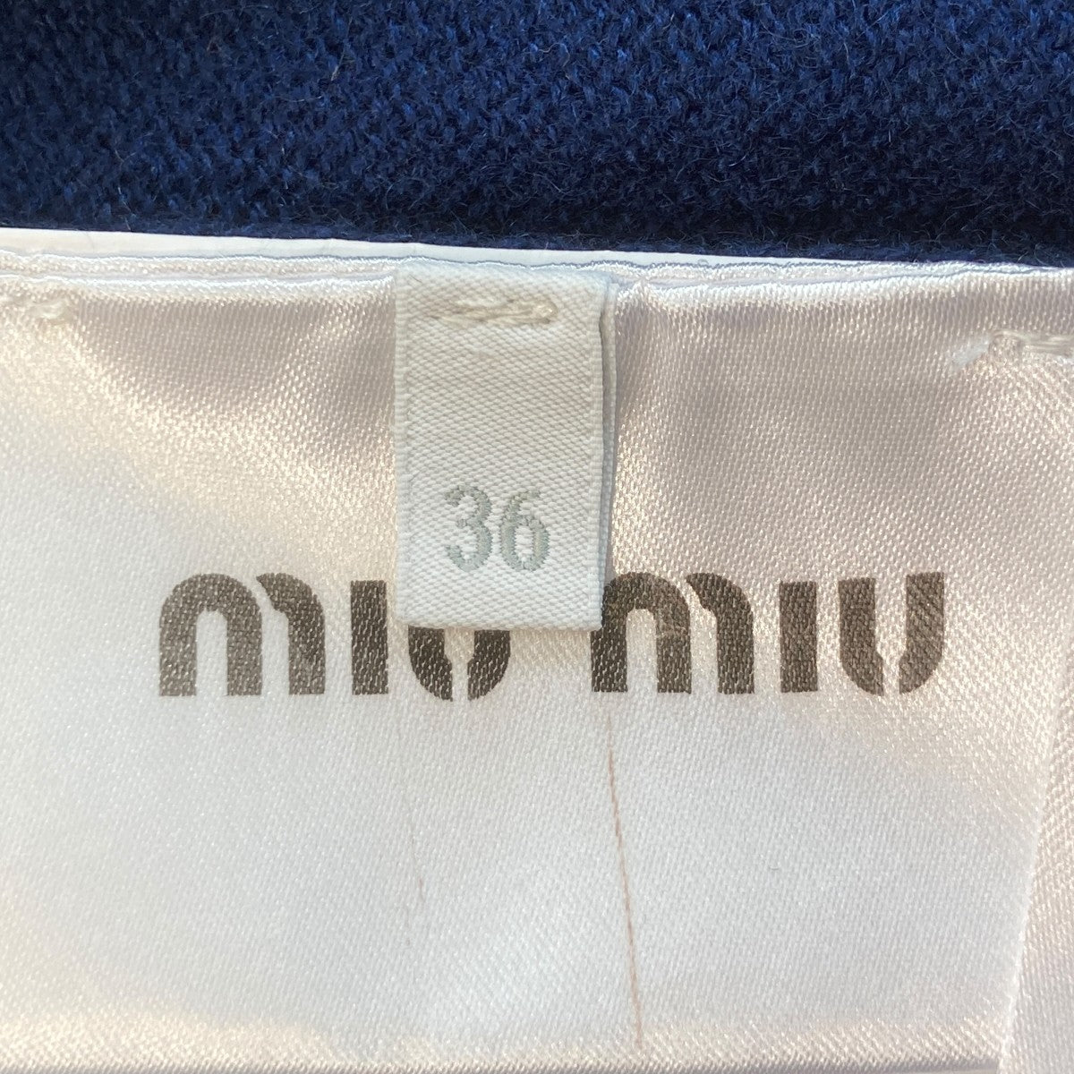 N miuページ MIU MIU(ミュウミュウ) ロゴVネックニットMML692 MML692 ブルー サイズ