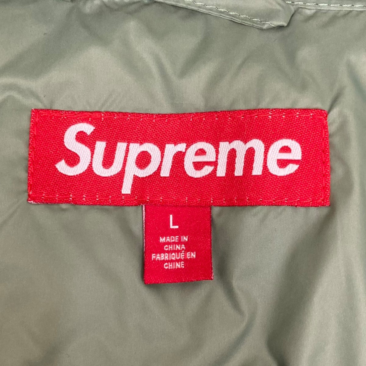 Supreme Micro Down Half Zip Hooded Pullover (FW23) - $238