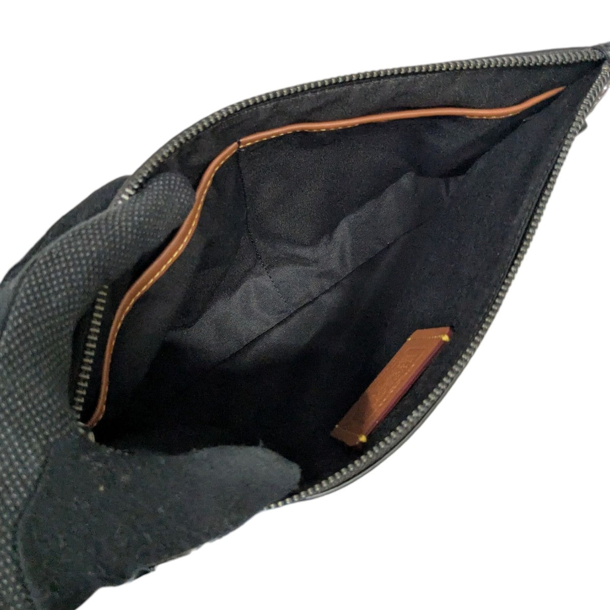 COACH(コーチ) Carry All Pouch In Signature Canvasクラッチ