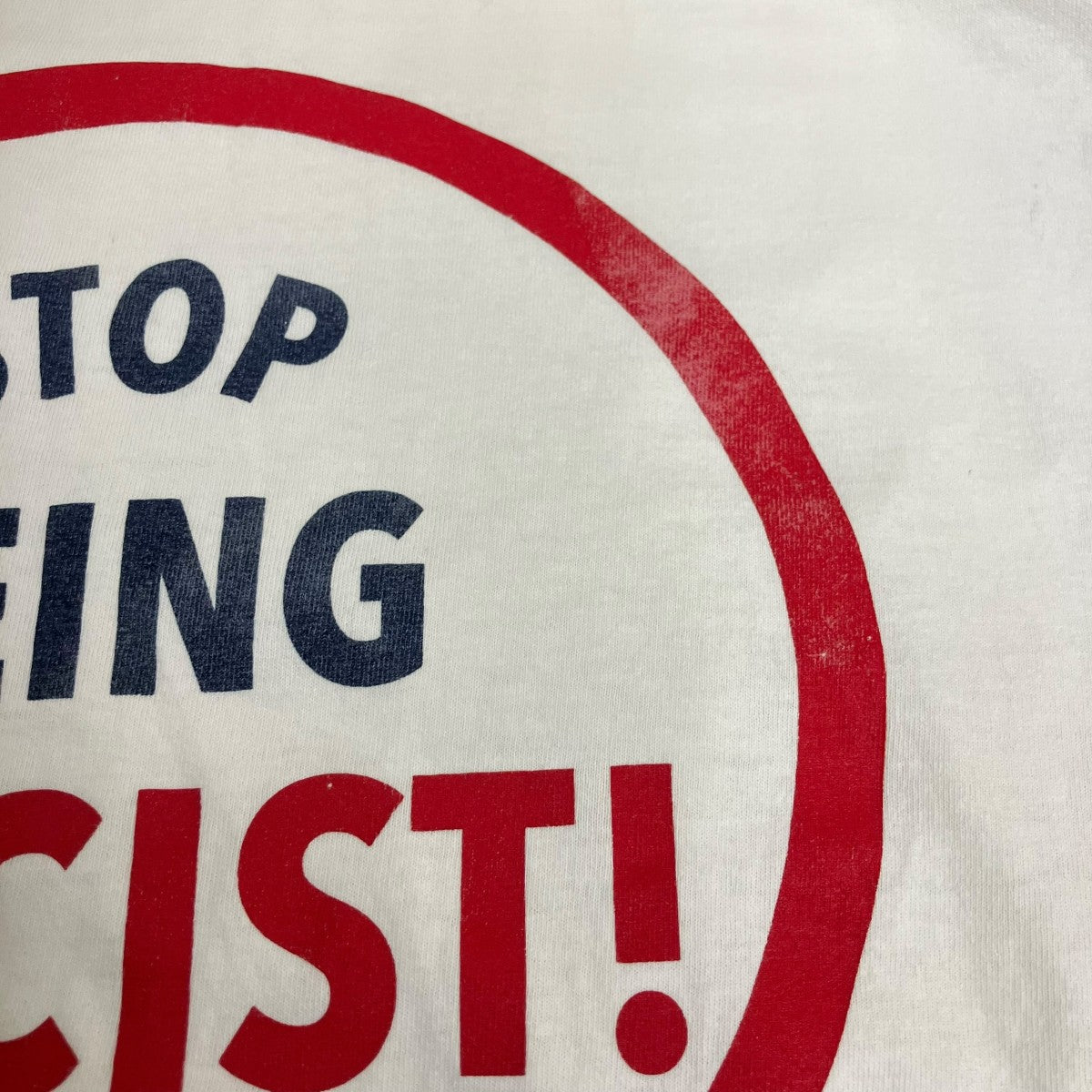 STOP BEING RACIST!半袖Tシャツ21071597002210