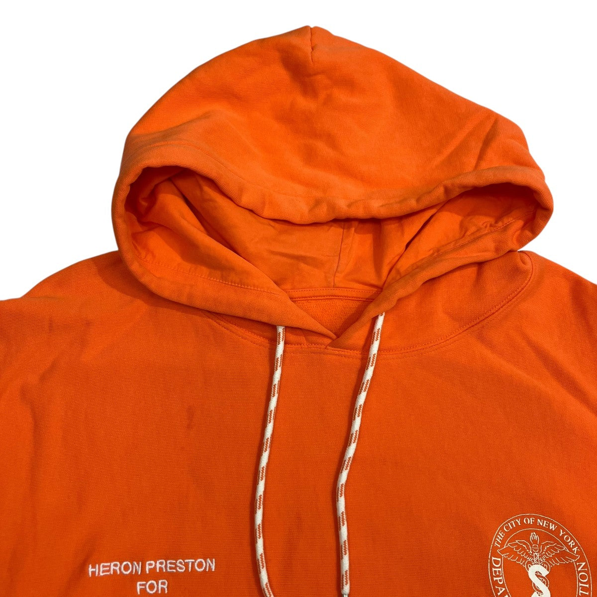 HERON PRESTON ヘロンプレストン × DSNY パーカー オレンジ HERON PRESTON(ヘロンプレストン) プルオーバーパーカー