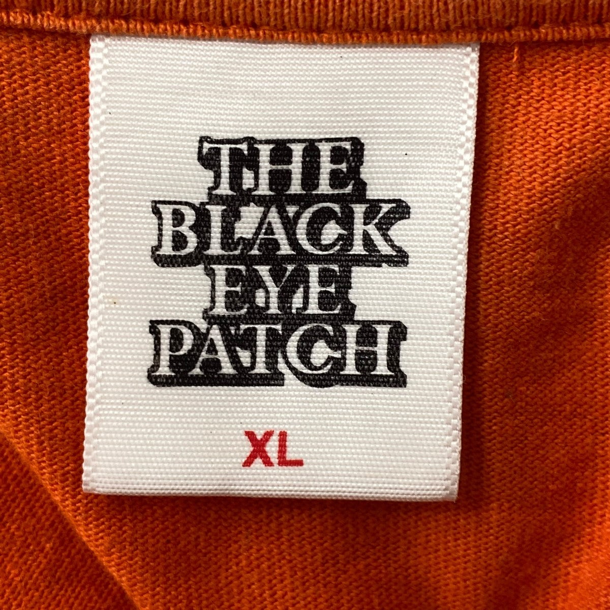 THE BLACK EYE PATCH(ブラックアイパッチ) Tシャツ オレンジ