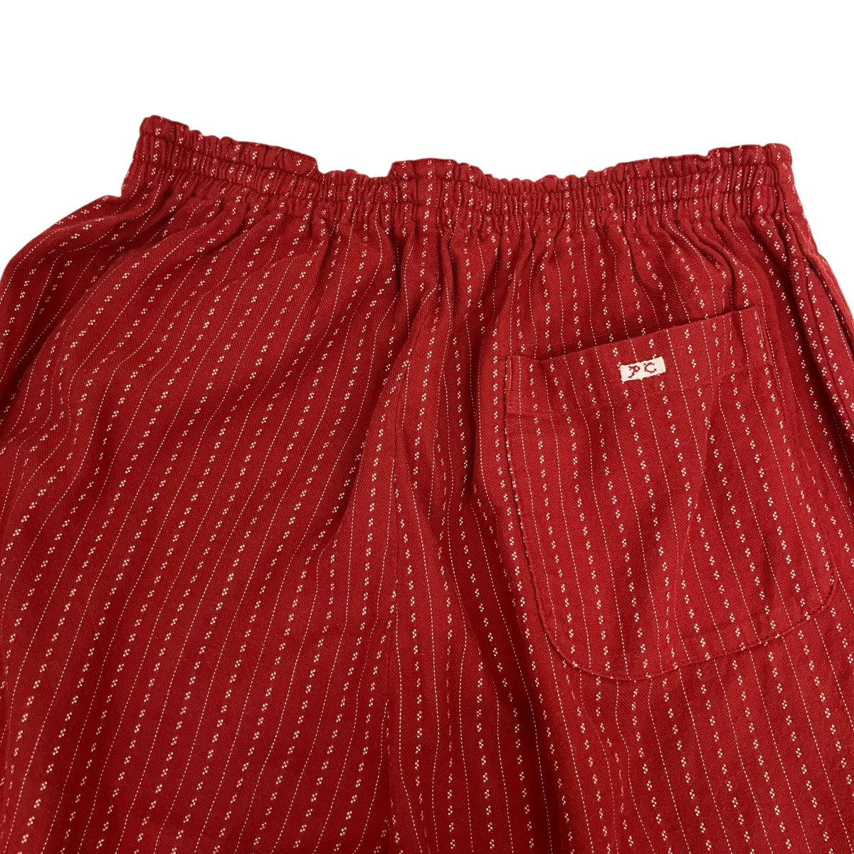 HAPPY RED PEACE PANTSコットンパンツ
