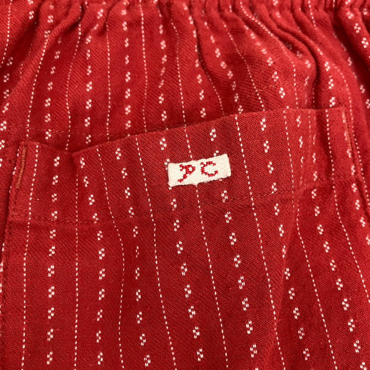 HAPPY RED PEACE PANTSコットンパンツ