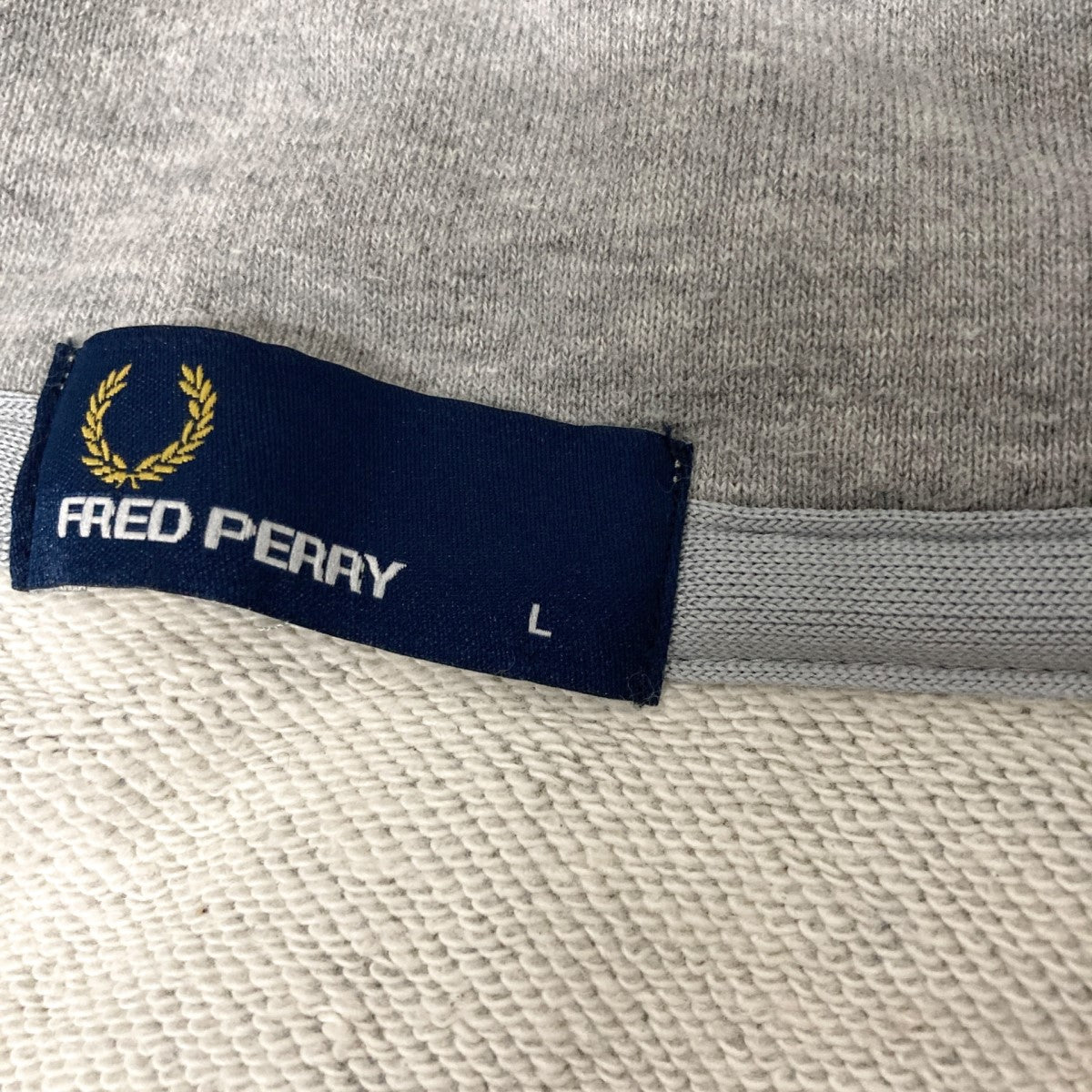 FRED PERRY 古着・中古 フレッドペリーのハーフジップスウェット FZ1773です。