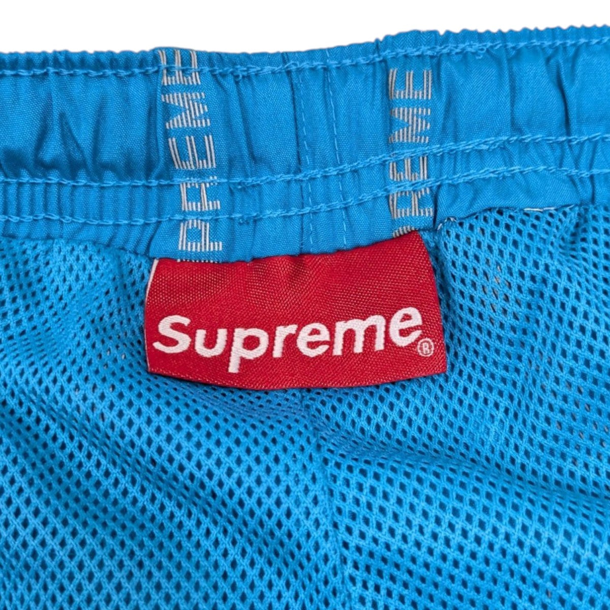 Supreme(シュプリーム) Reflective Text Track pantsナイロン総柄