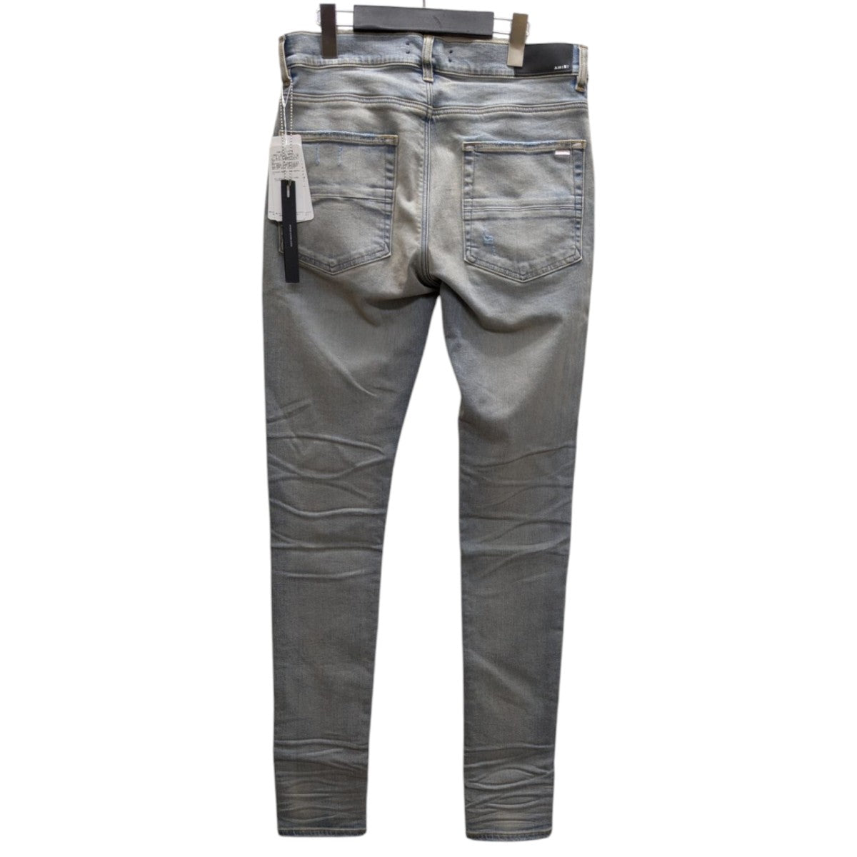 AMIRI プリントデニムパンツ グレー AMIRI プリントデニムパンツ グレー AMIRI ロゴ ジーンズ | ブルー