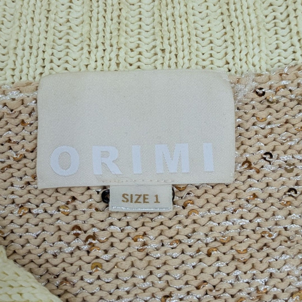 ORIMI(オリミ) 24SS GRITTER KNIT POROスパンコールジップカーディガン 