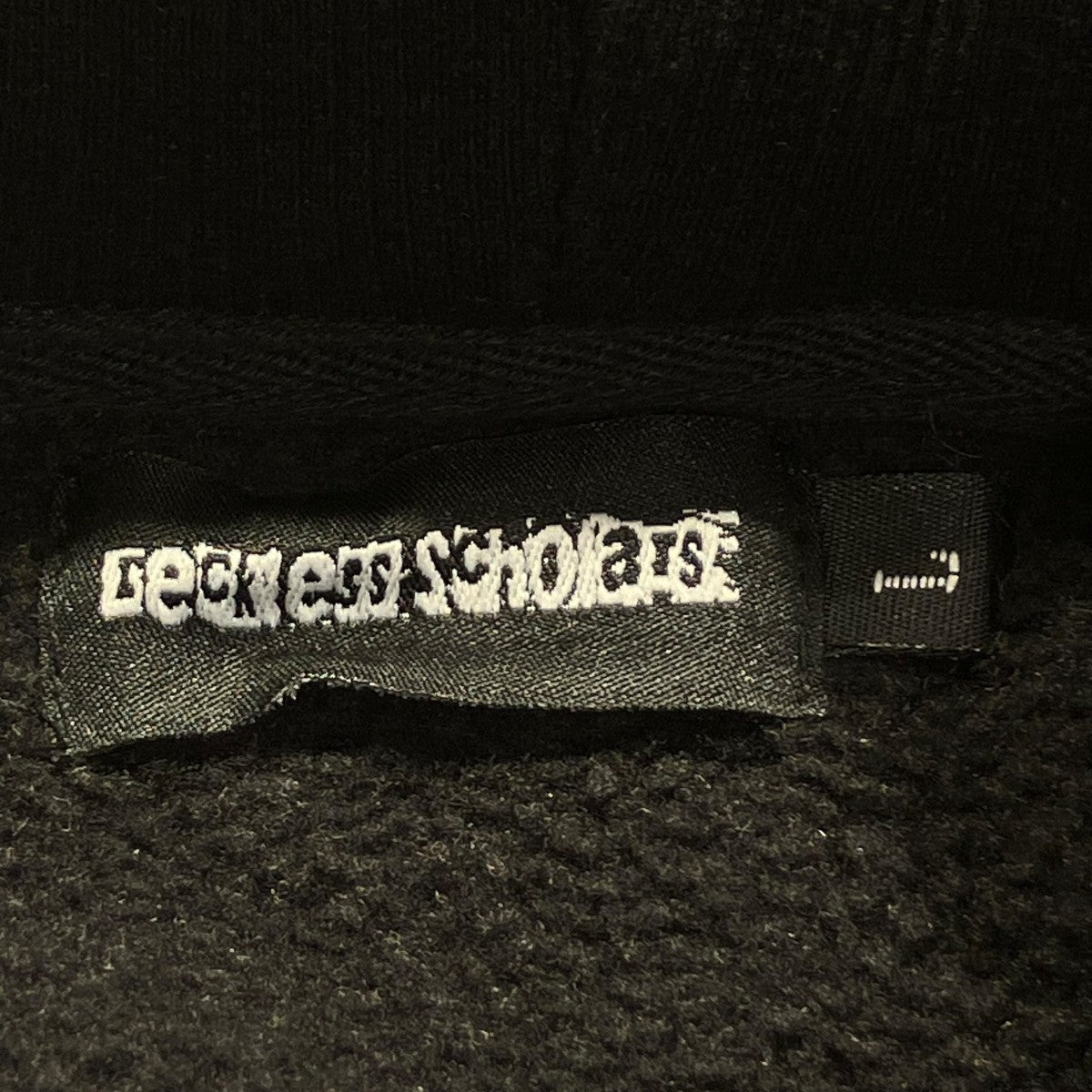 Reckless Scholars(レックネススカラーズ) デザインパーカー