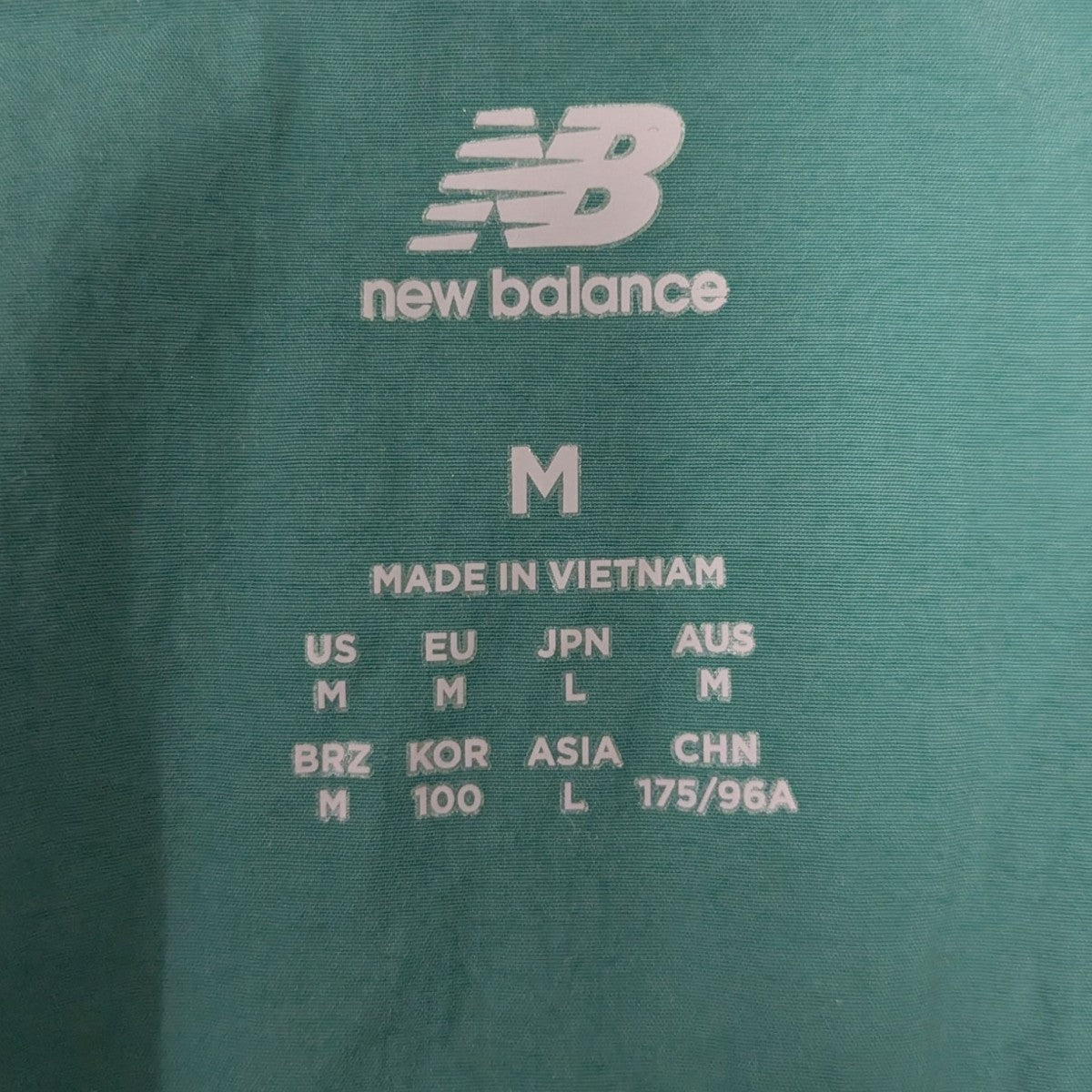 NEW BALANCE ウーブンナイロンジャケット 古着・中古-6枚目のアイテム画像