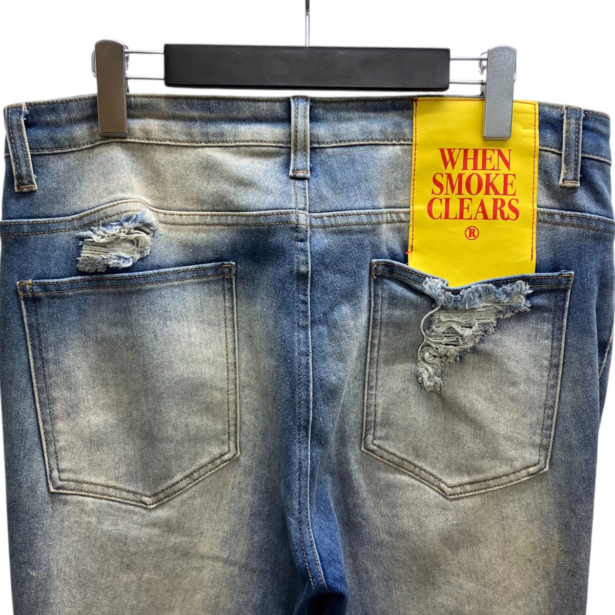 DISTRESSED NAILHEAD JEANS デニムパンツ