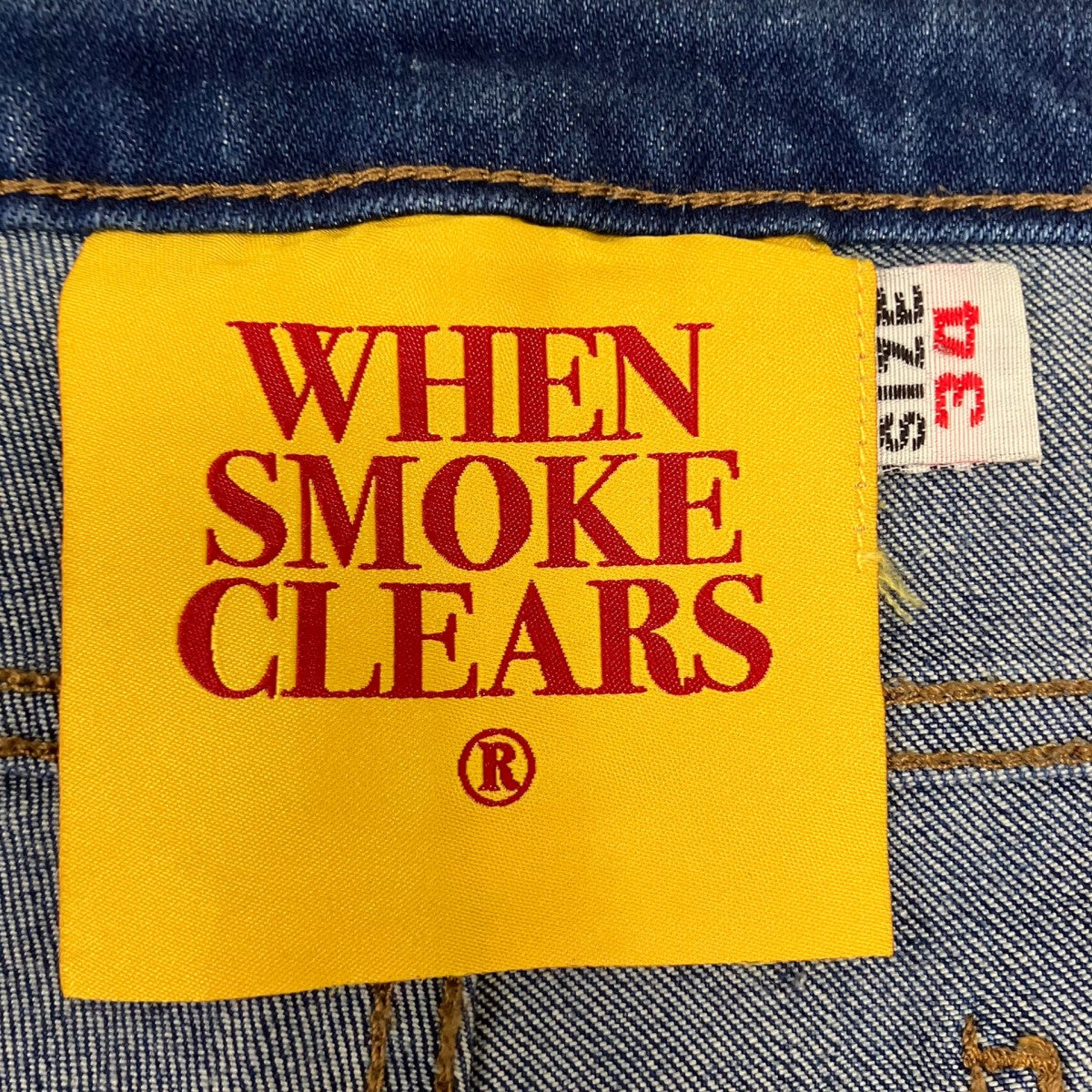 DISTRESSED NAILHEAD JEANS デニムパンツ