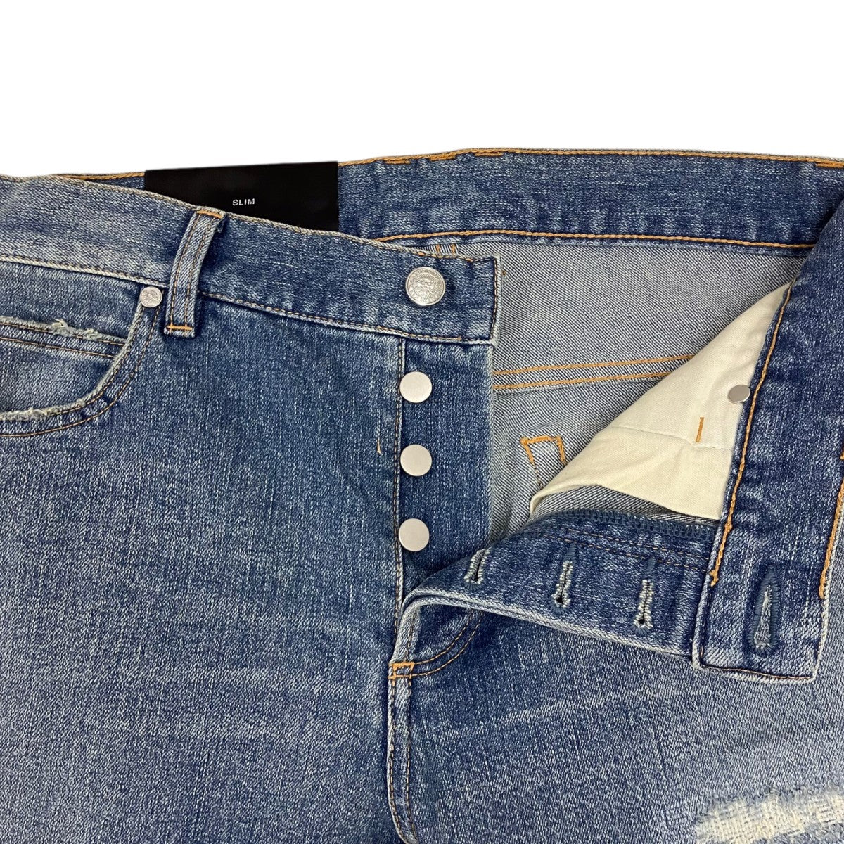 ダメージ加工デニムパンツ