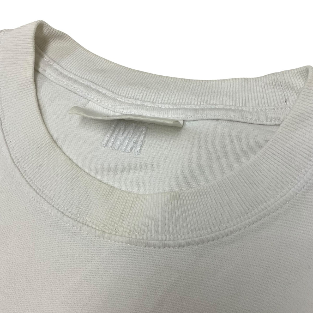 胸ロゴTシャツ