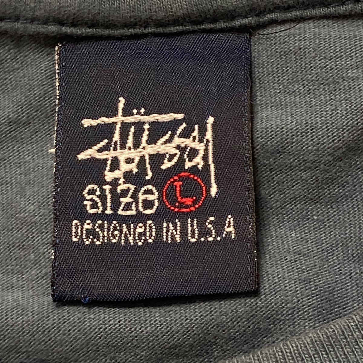 stussy(ステューシー) 90S 紺タグフロントプリント半袖Tシャツ