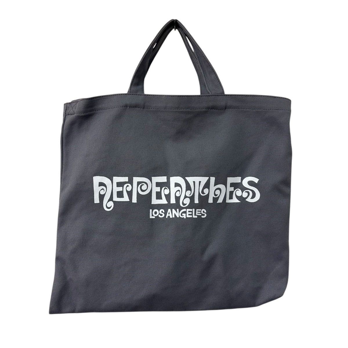 Nepenthes × Unlikely トートバッグ 15周年 Nepenthes × Unlikely トートバッグ 15周年 Unlikely〉 POP-UP