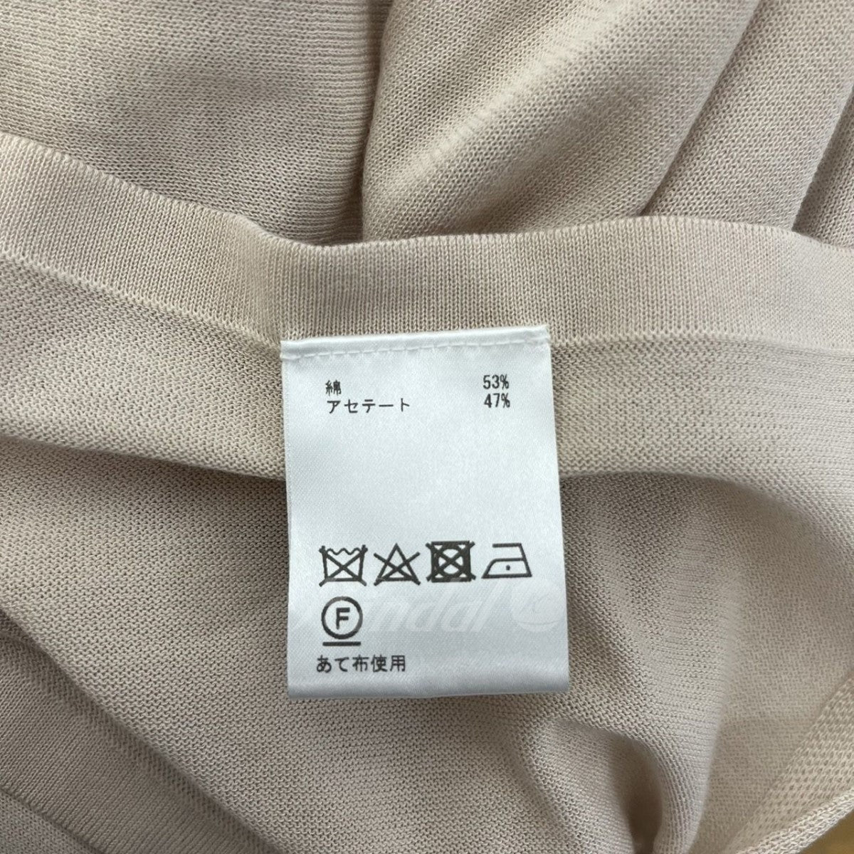 ポンチョアシメニットトップ　レイヤードニット