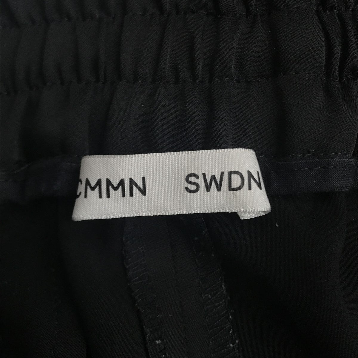 CMMN SWDN(コモン スウェーデン) トラックパンツ ブラック