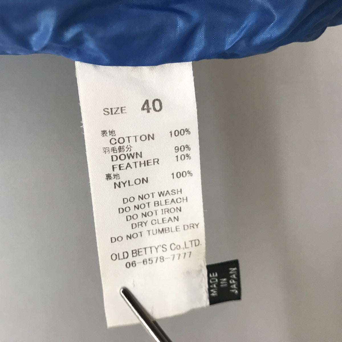 ハーフジップ ステンシルプリントダウンベスト