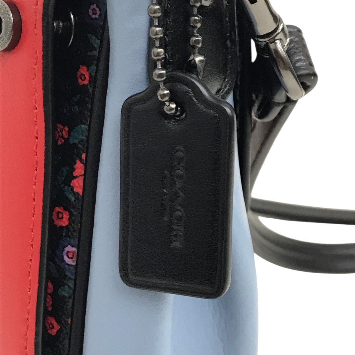 ランチフローラルリバーシブルクロスボディショルダーバッグF59535