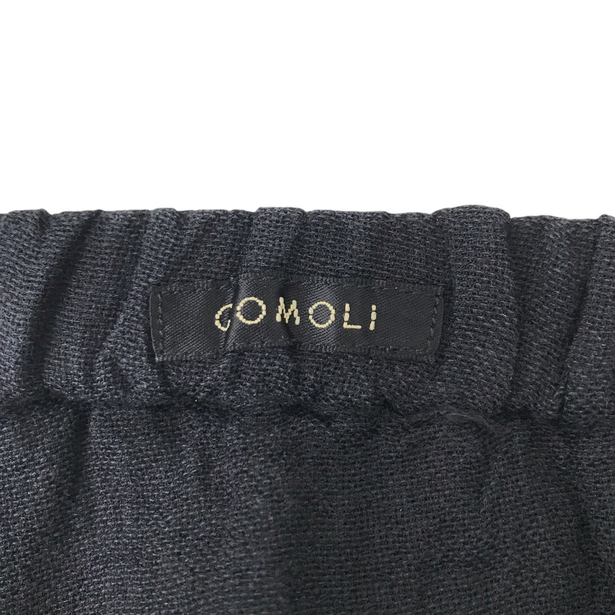COMOLI(コモリ) 25SSフェードブラック ニータックパンツB01-03018 B01