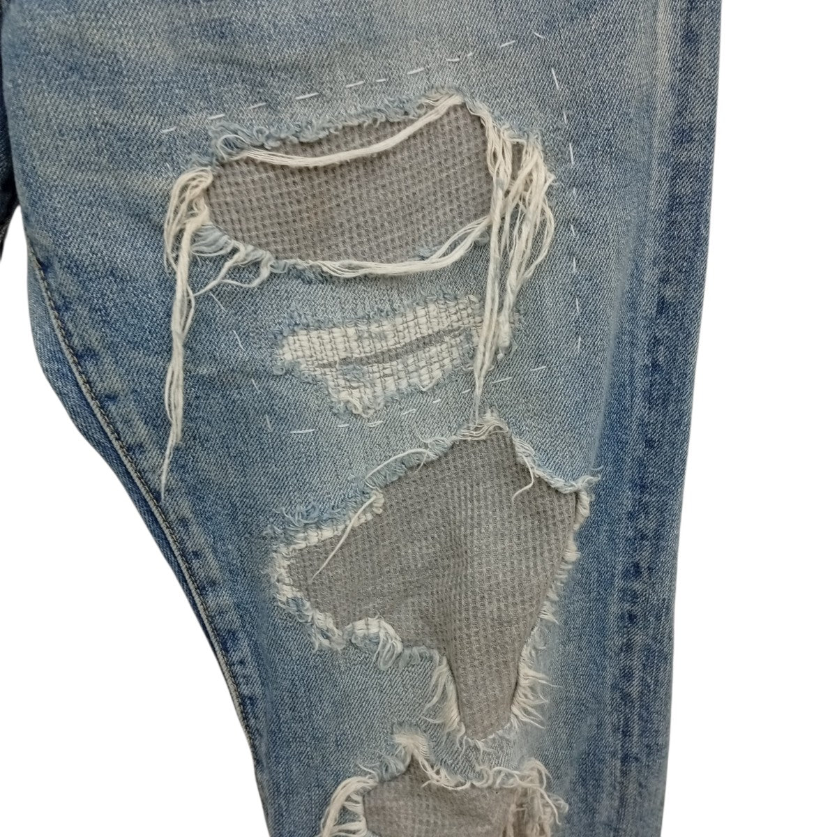 ダメージ加工デニムパンツ