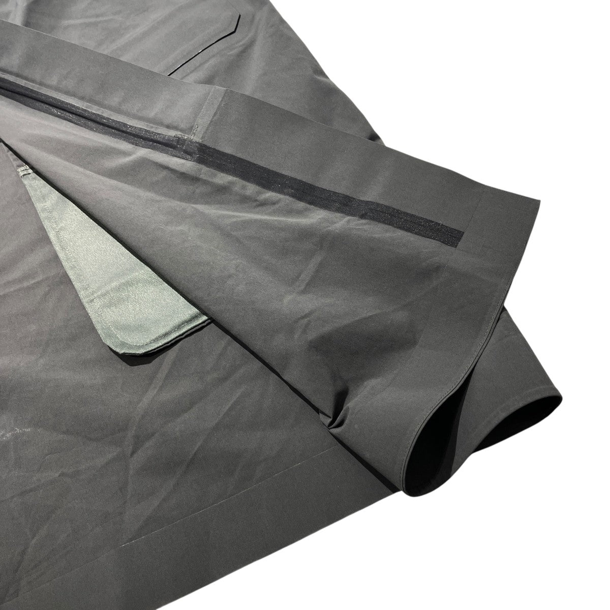 COMPACTION DRIZZLE DWR COATフード付きスタンドカラーコートDAMSGC50