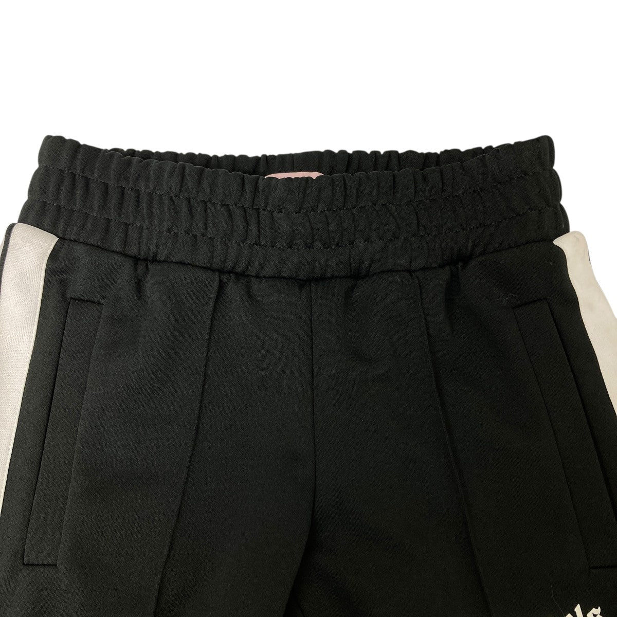 PalmAngels パンツ Palm Angels Curved Logo Nylon Track Pants in Black | REVOLVE