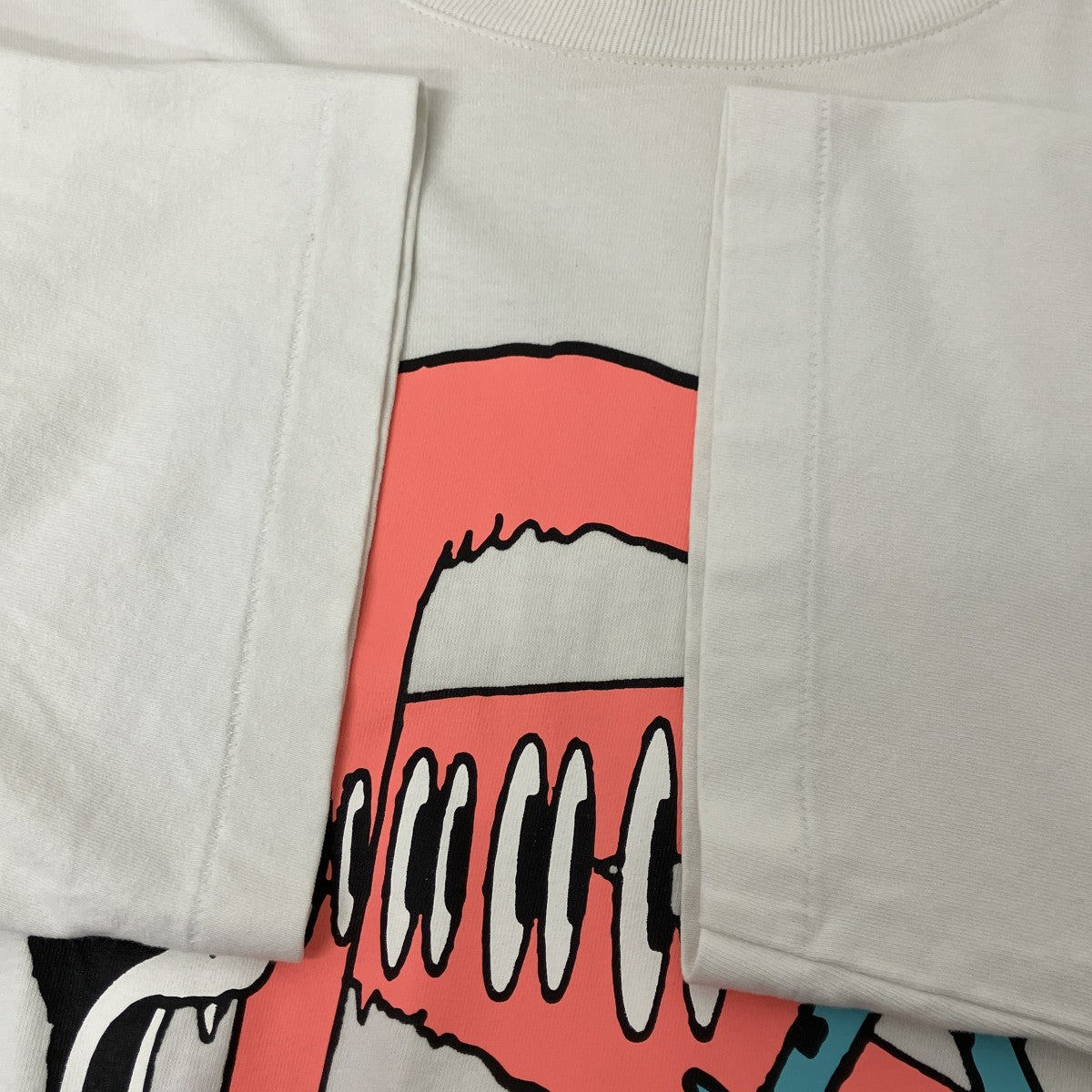 SHOCK S SL Tee プリントTシャツ