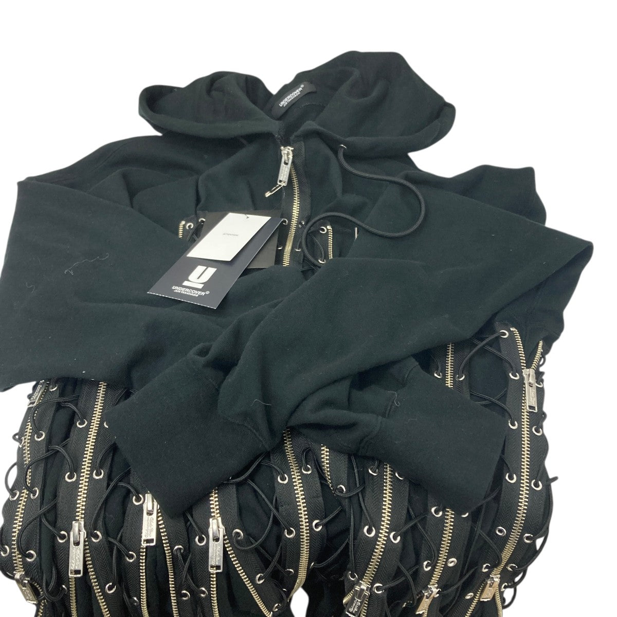 ニウラケハトメ レースアップジップパーカー