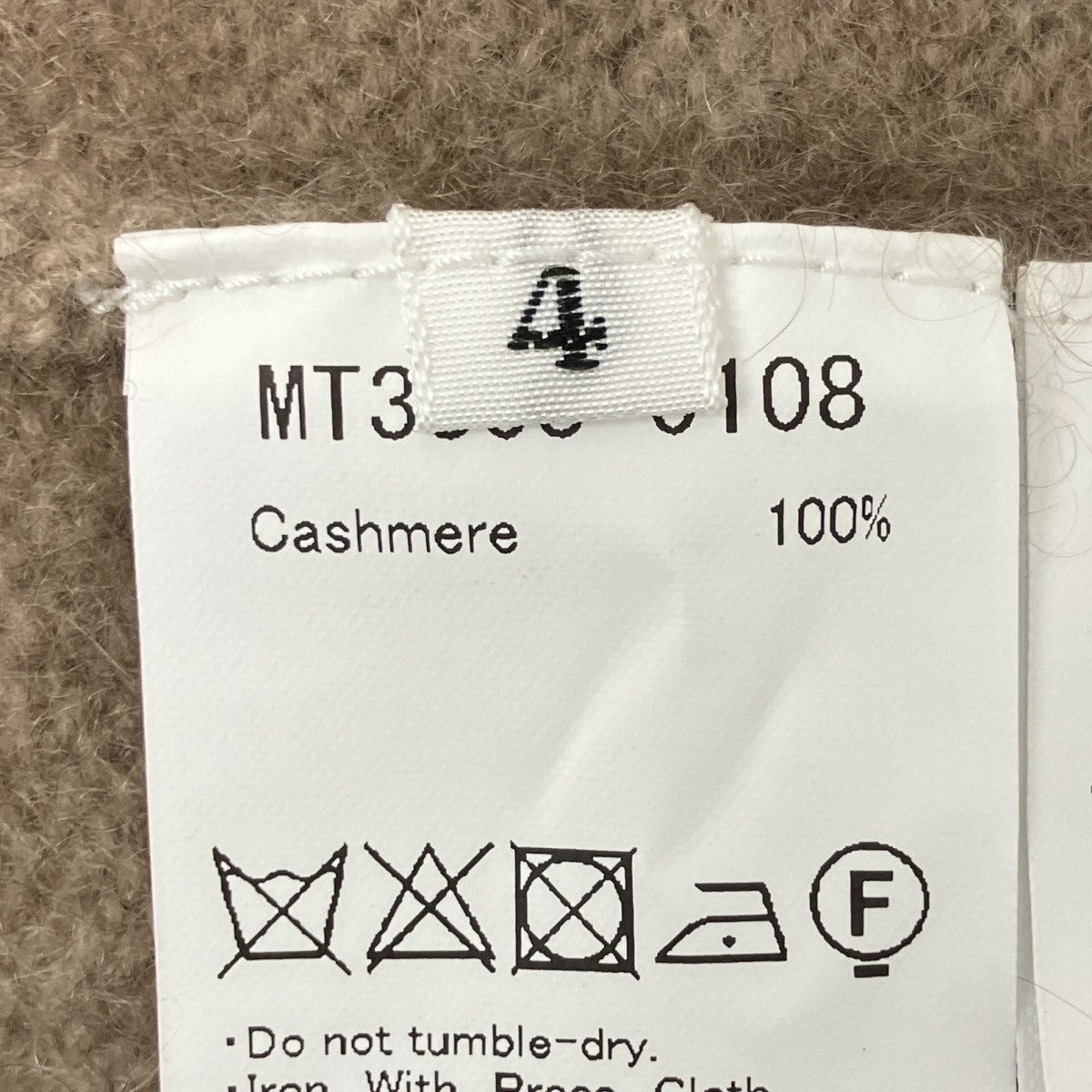 カシミヤ 強圧縮ジップベスト