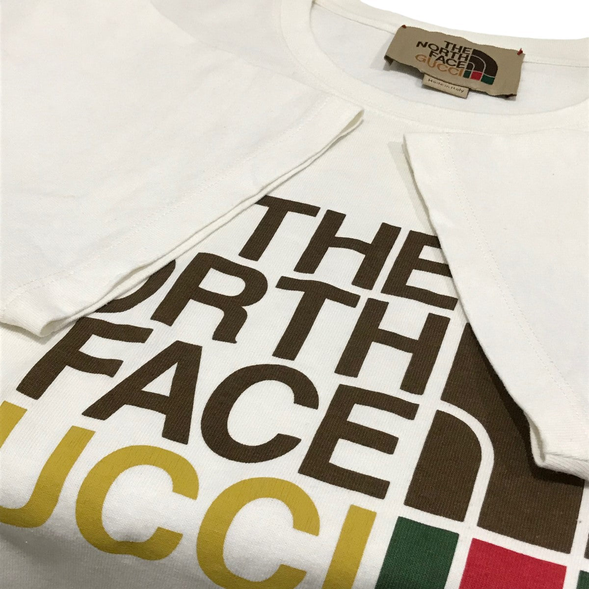 グッチ GUCCI GUCCI × THE NORTH FACE Tシャツ ロゴ コットン オフホワイト 615044 レディース 中古 GUCCI - グッチ GUCCI GUCCI × THE NORTH FACE カットソー 衣料