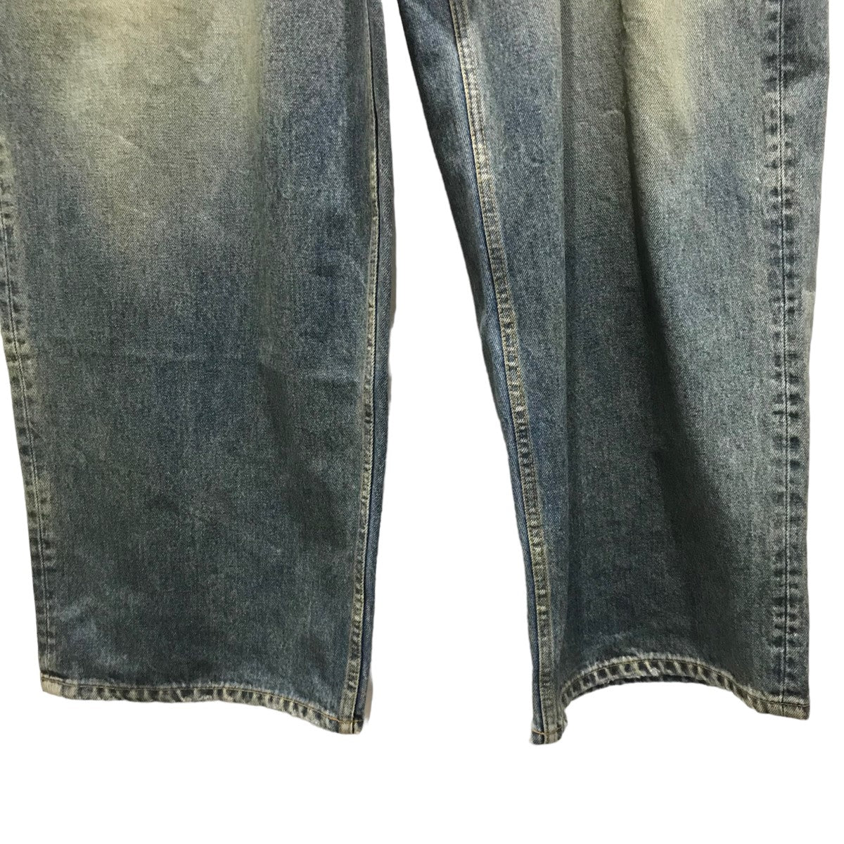 BALENCIAGA コーティング加工バギーデニムパンツ719341 の古着・中古アイテム