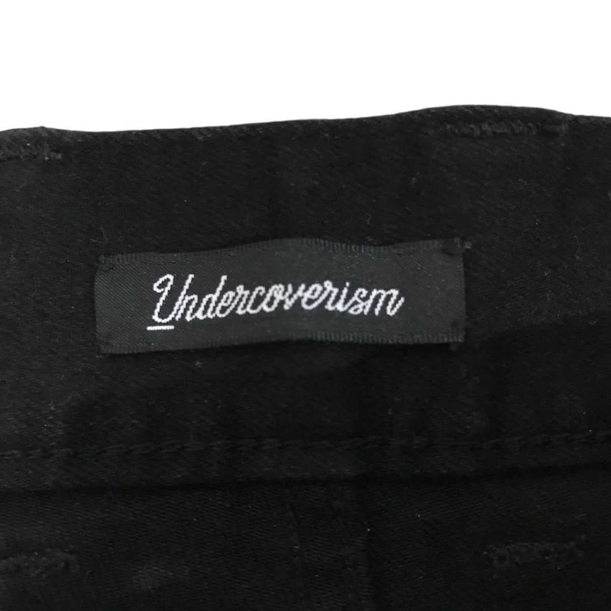 UNDERCOVERISM(アンダーカバーイズム) 裾ZIPストレッチスリムデニム