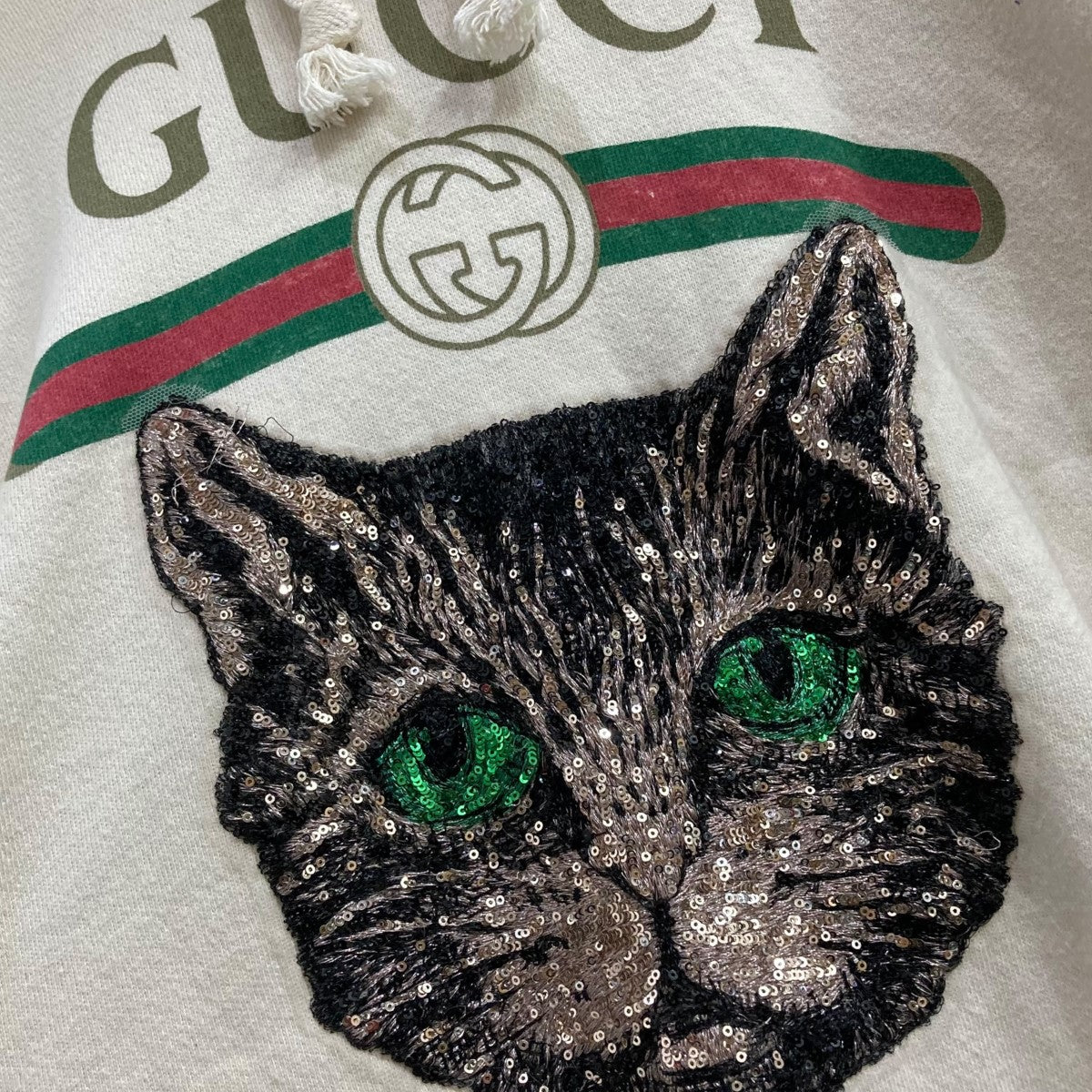 GUCCI(グッチ) キャットビジュープルオーバーパーカー アイボリー サイズ S｜【公式】カインドオルオンライン  ブランド古着・中古通販【kindal】