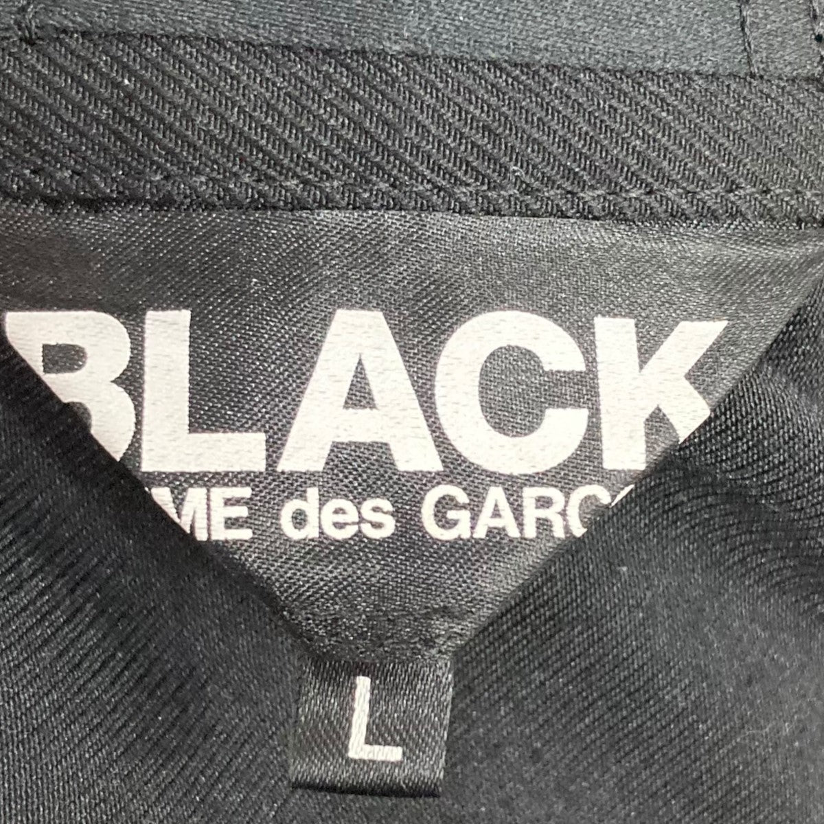 BLACK COMME des GARCONS 古着・中古 ブラックコムデギャルソンのテーラードジャケット 1K-J014です。
