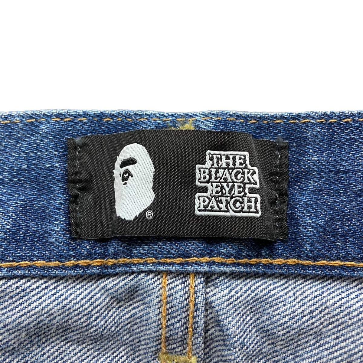 A BATHING APE×THE BLACK EYE PATCH デニムパンツ 001DPK231901C