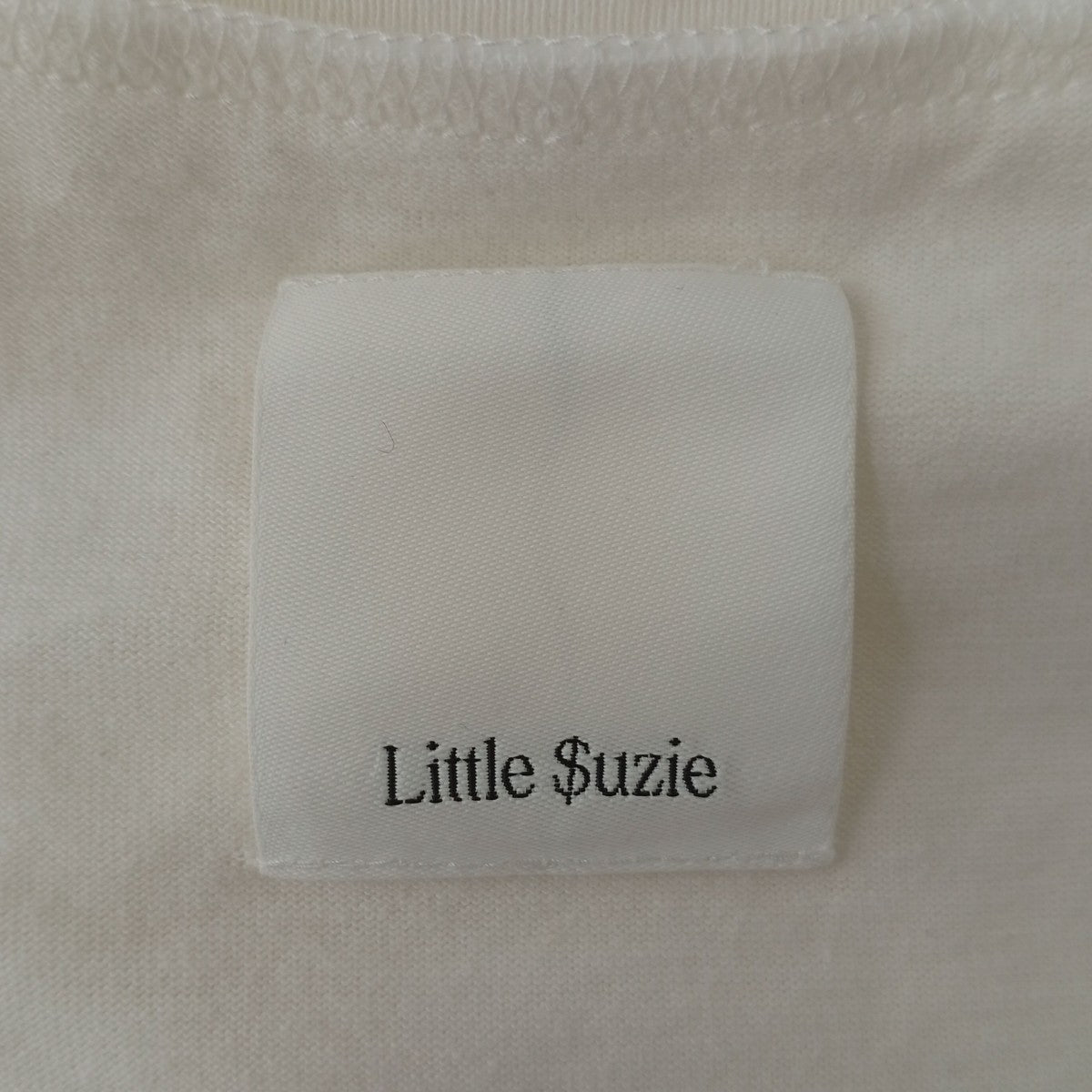 little Suzie(リトルスージー) スリットクロスデザインTシャツトップス