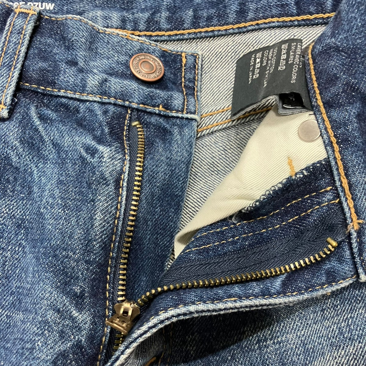 ウォッシュド加工デニムパンツ