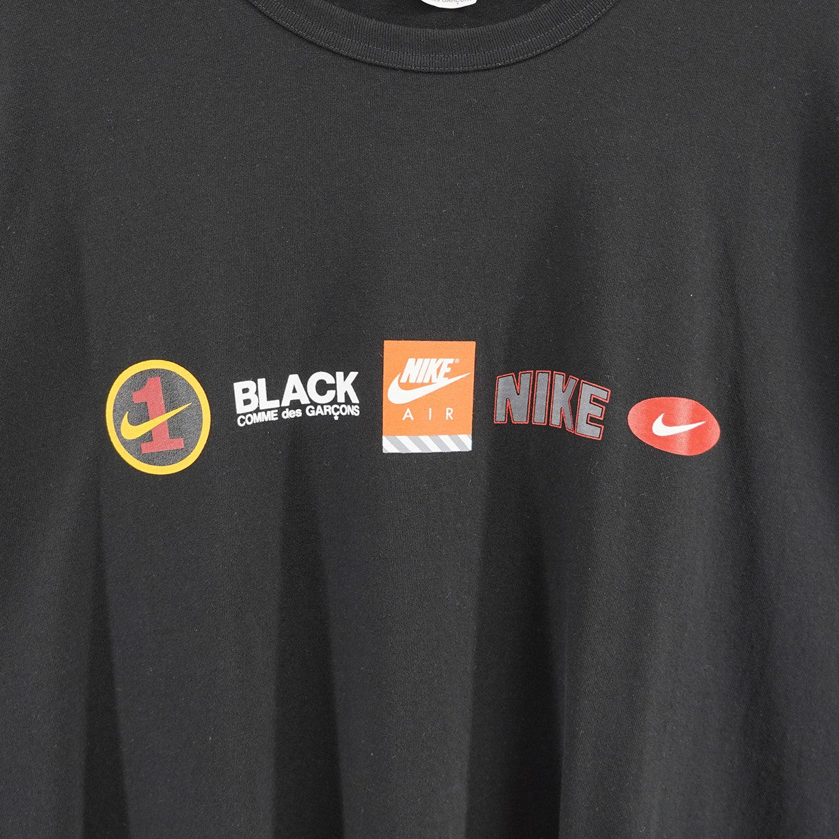 BLACK COMME des GARCONS(ブラックコムデギャルソン) 24SS綿天竺 NIKE プリント オーバーサイズ ロゴ コラボ Tシャツ  1M-T101-052 ブラック サイズ L｜【公式】カインドオルオンライン ブランド古着・中古通販【kindal】